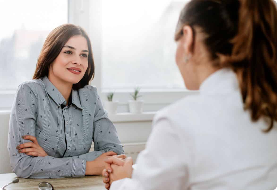 Two people consultation table indoor professional setting